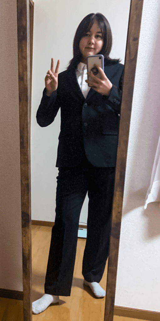 kat in a suit for her first day and opening ceremony. 7 Things to bring on your first day as an English teacher in Japan
