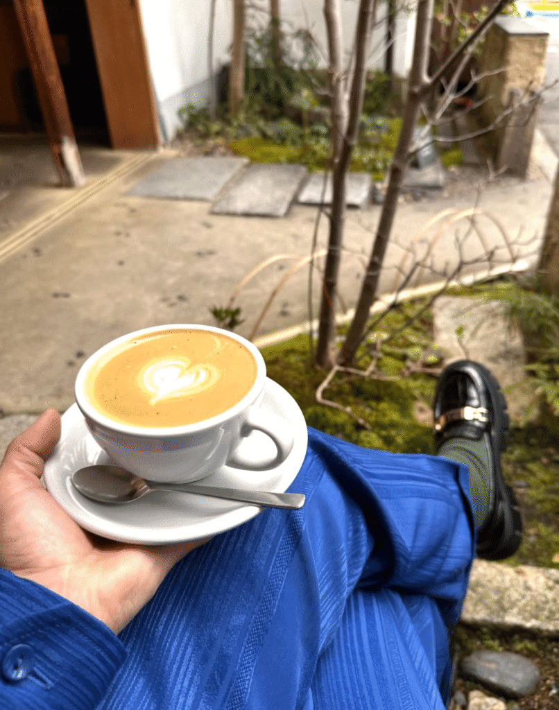 jace holding a coffee
