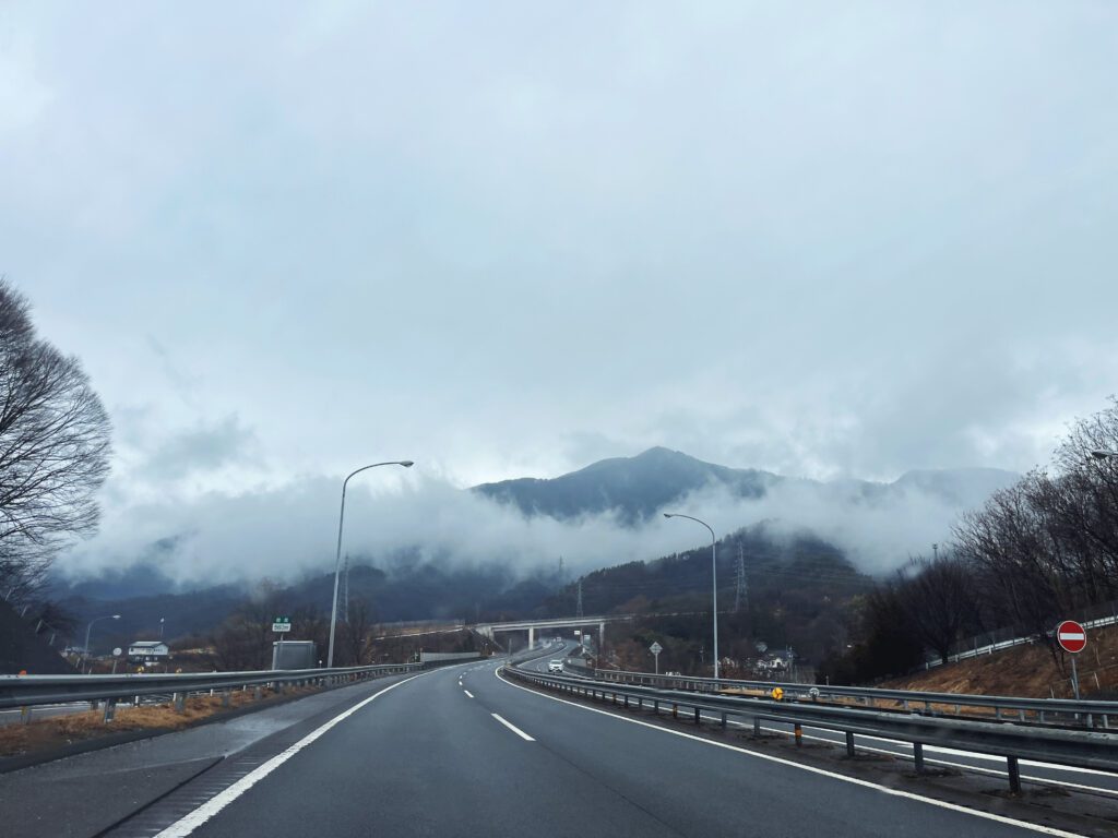 mountains of nagano on the road wreathed in clouds