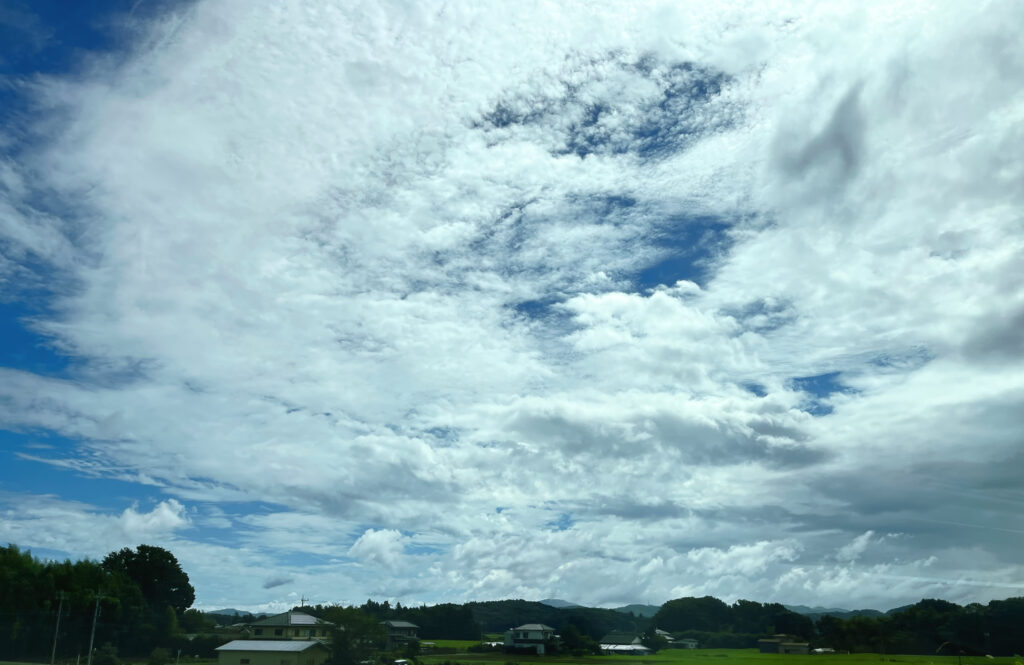 japan clouds and countryside in summer